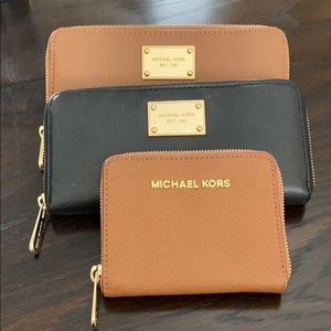 3 Michael Kors wallets